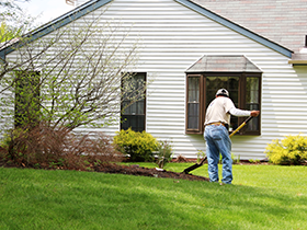 Levanduski Landscapes Employee Applying Mulch